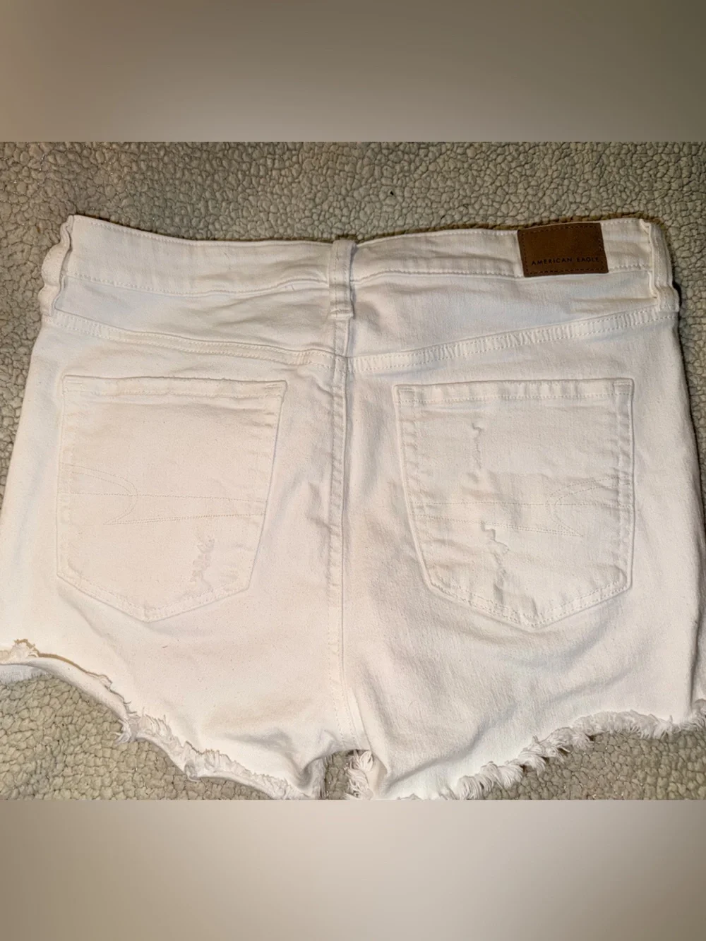 American Eagle White Distressed Denim Shorts – Size 10